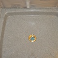 Shower Pan Glued in and Drain Ready for Final Assembly.JPG
